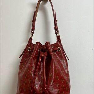 Red Dooney and Bourke drawstring bag in excellent condition